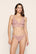 Model is wearing Mariana Thong in Woodrose