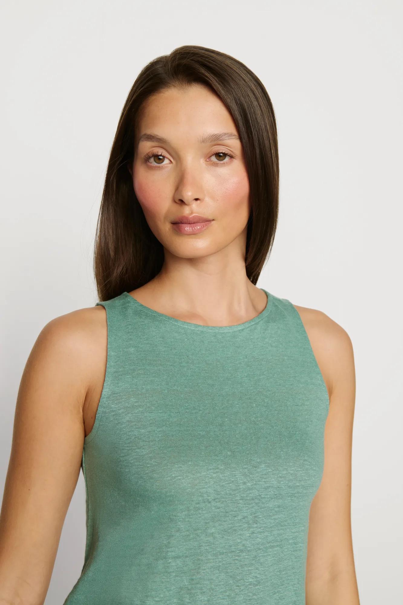Model is wearing Organic Linen Knit Boat Neck Crop Tank in Seagrass