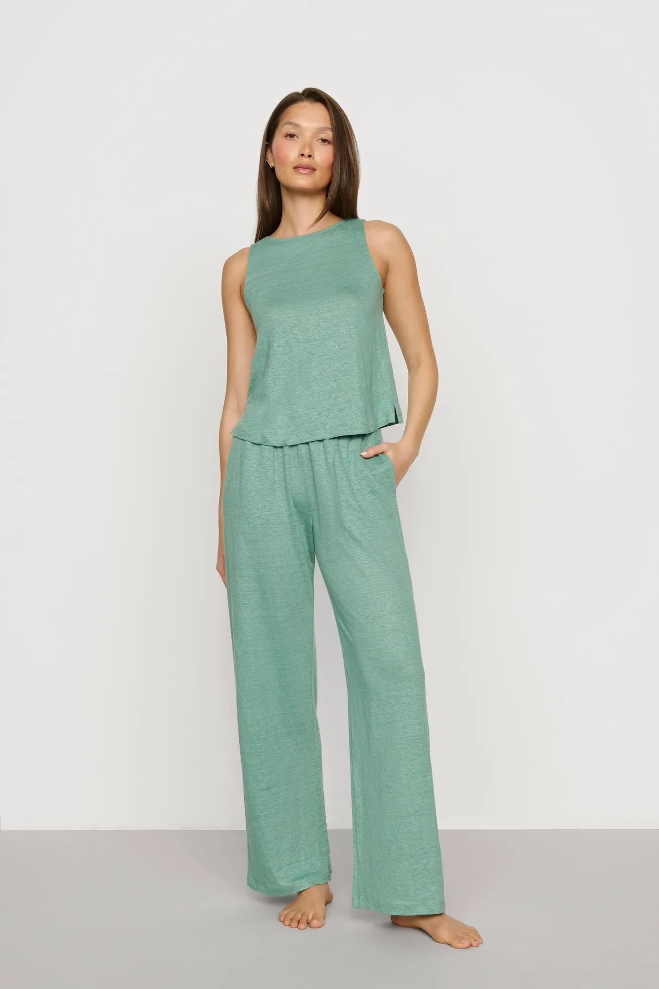 Model is wearing Organic Linen Knit Boat Neck Crop Tank in Seagrass