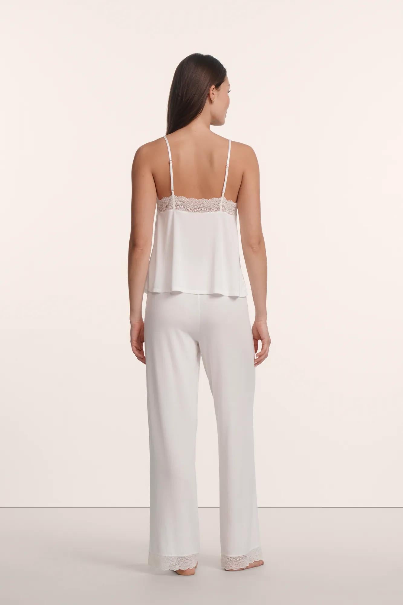 Model is wearing Lara TENCEL™ Modal Cami & Pant PJ Set in Ivory