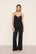 Model is wearing Kari Cami & Pant PJ Set in Black