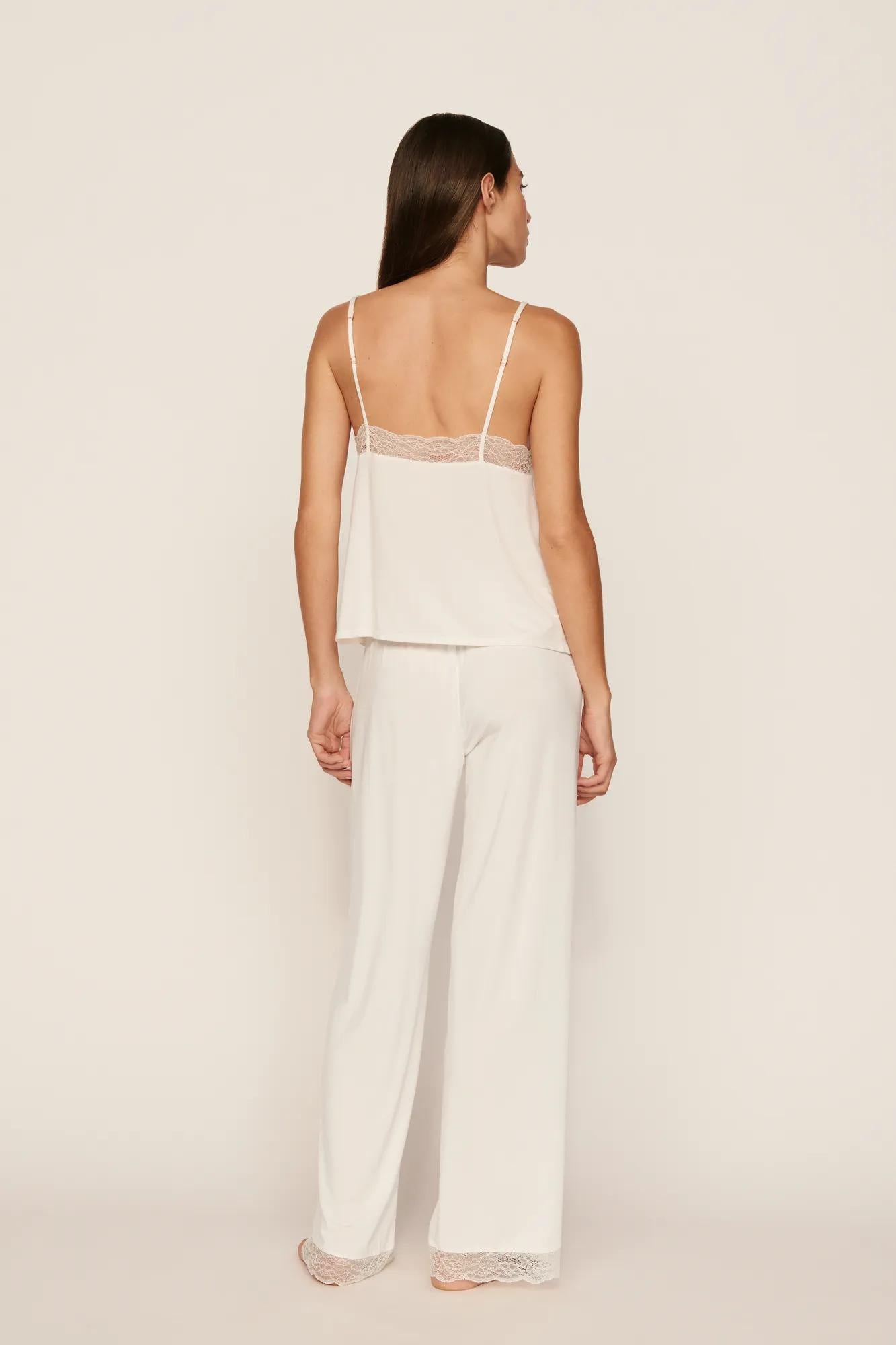 Model is wearing Kari Cami & Pant PJ Set in Ivory
