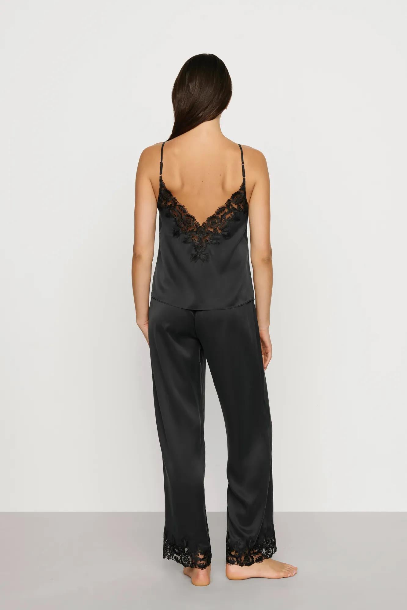 Model is wearing Washable Silk with Lace Embroidery Cami & Pant PJ Set in Black