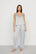 Model is wearing Washable Silk with Lace Embroidery Cami & Pant PJ Set in Powder Blue