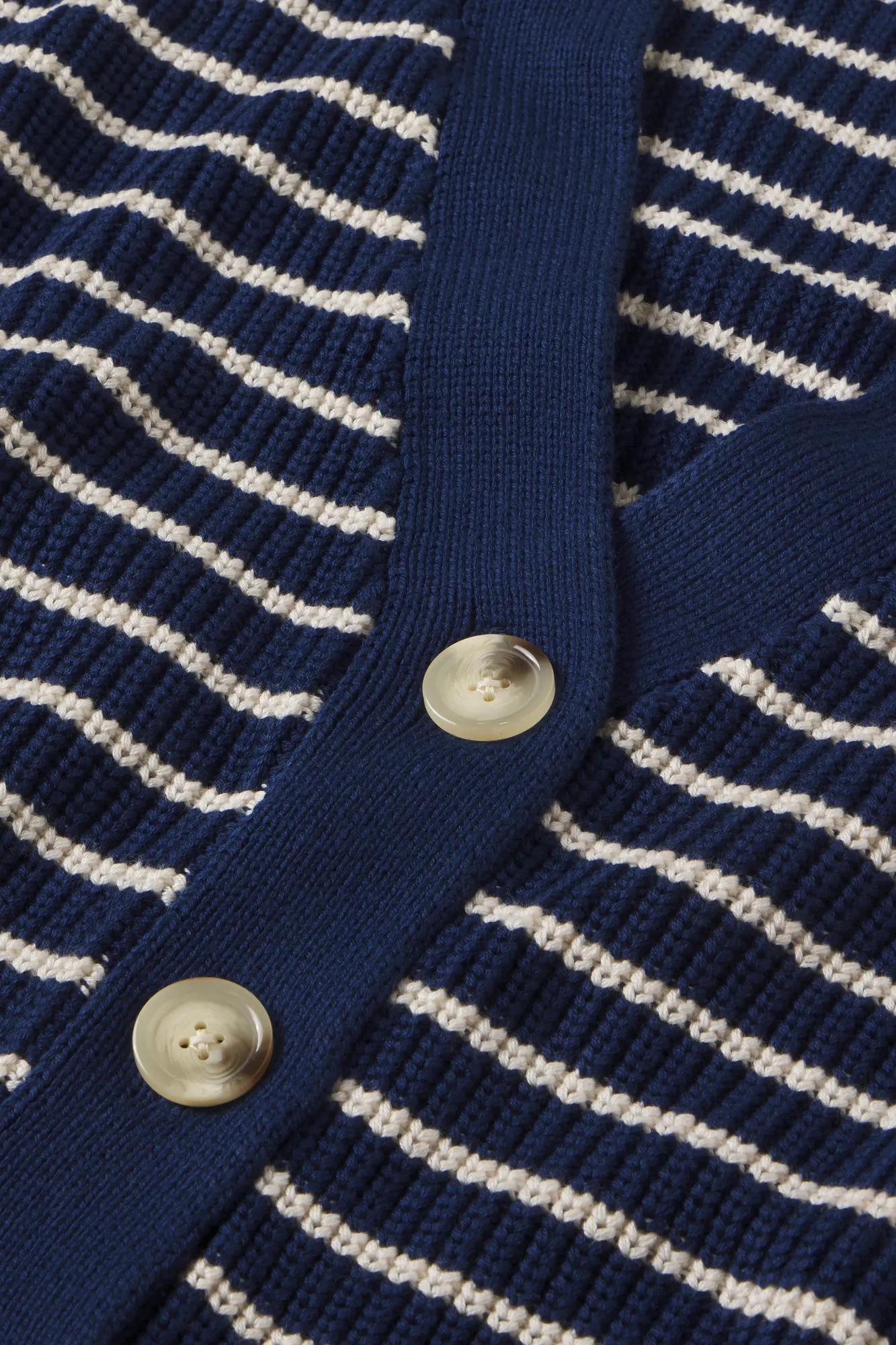 Model is wearing Coastal Cotton Sweater Cardi in Stripe Navy/Almond Heather