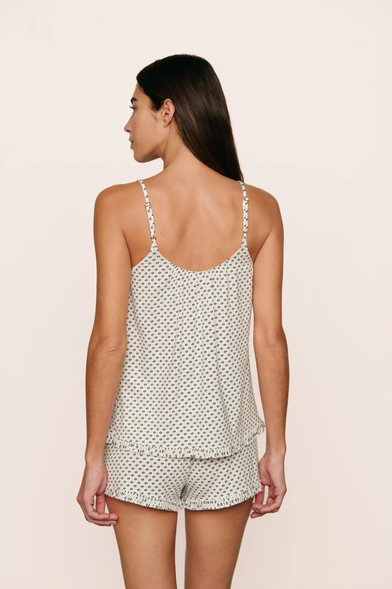 Model is wearing Gisele TENCEL™ Printed Modal Ruffle Cami & Shortie Short Set in Tide Dot Ivory