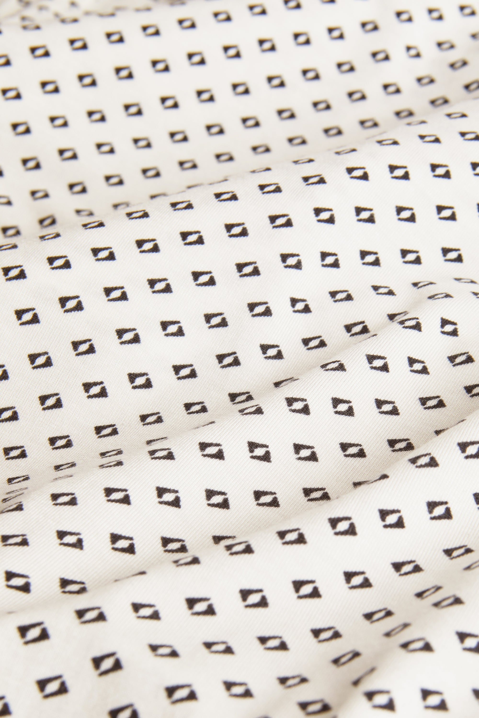 Fabric swatch of TENCEL Modal Tide Dot Ivory