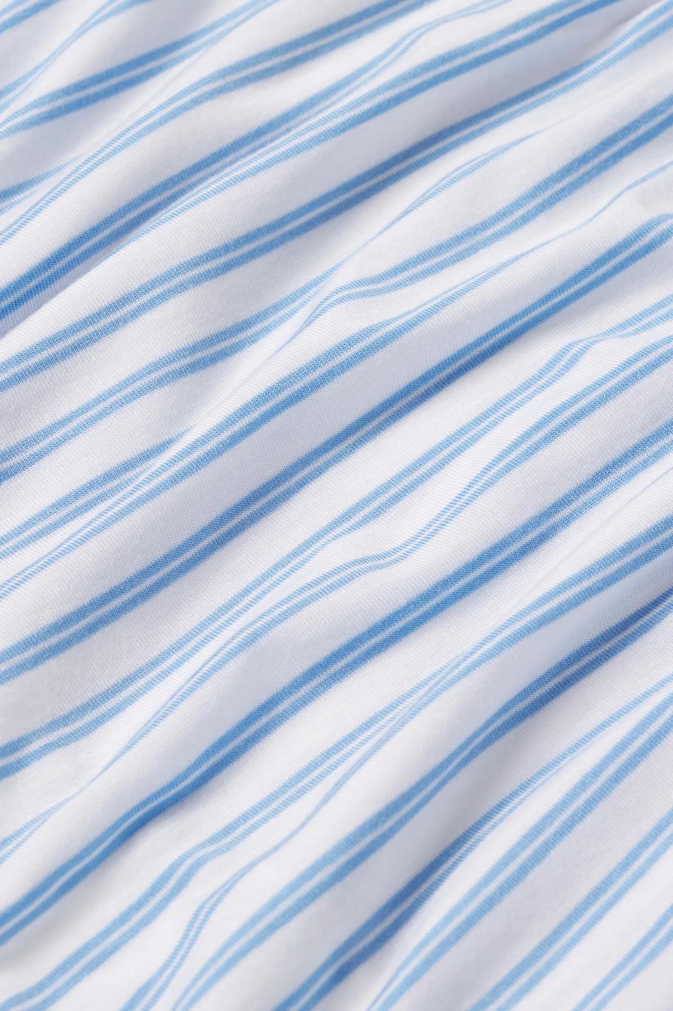 Model is wearing Isla TENCEL™ Modal Cami & Straight Leg Pant PJ Set in Regatta Stripe Summer Blue/Whi