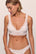 Model wears Mariana Bralette in White