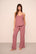 Model is wearing Gisele TENCEL™ Modal Cami & Pant PJ Set  in  Berry Blush