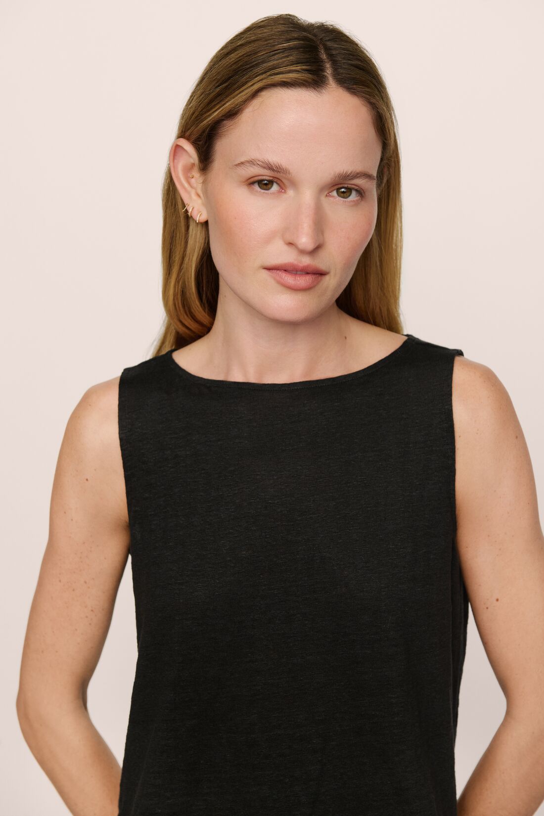 Model is wearing Organic Linen Knit Boat Neck Crop Tank in Black