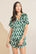 Model wears Inez Washable Silk Printed Short PJ Set in Mosaic Tile Forest Green/Navy.