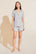 Model wears Gisele TENCEL™ Modal Rib Relaxed Short PJ Set in light heather grey.