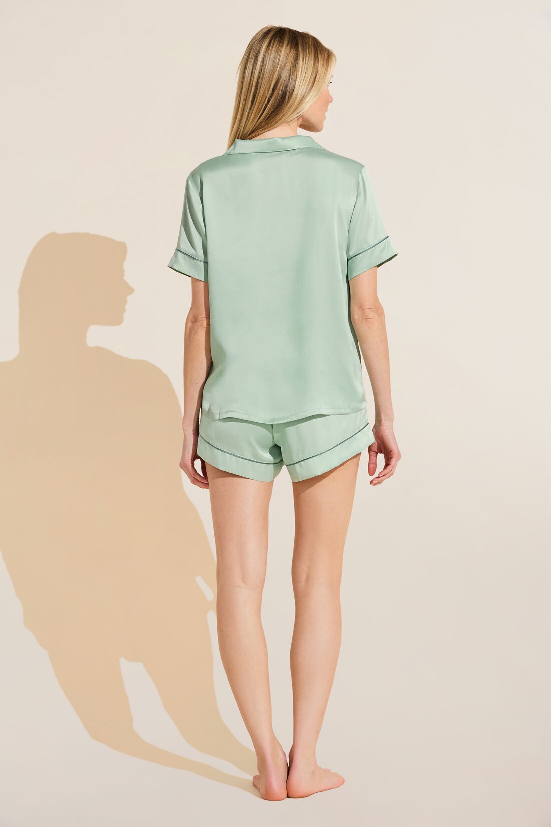Model wears Inez Washable Silk Short PJ Set in Surf Spray/Agave.