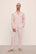 Model wears William Printed TENCEL™ Modal Long PJ Set in Duo Stripe Haute Red/Haute Red.