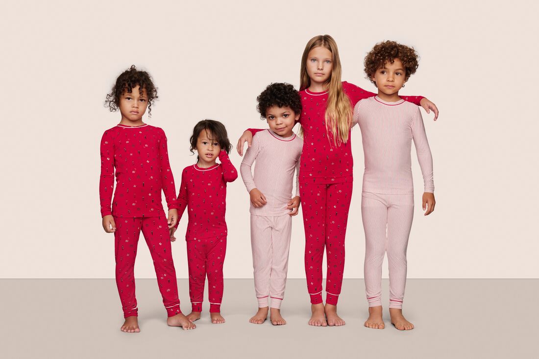 Kids wearing PJs in Duo Stripe Holly Red/Holly Red and Nutcracker Red/Ivory