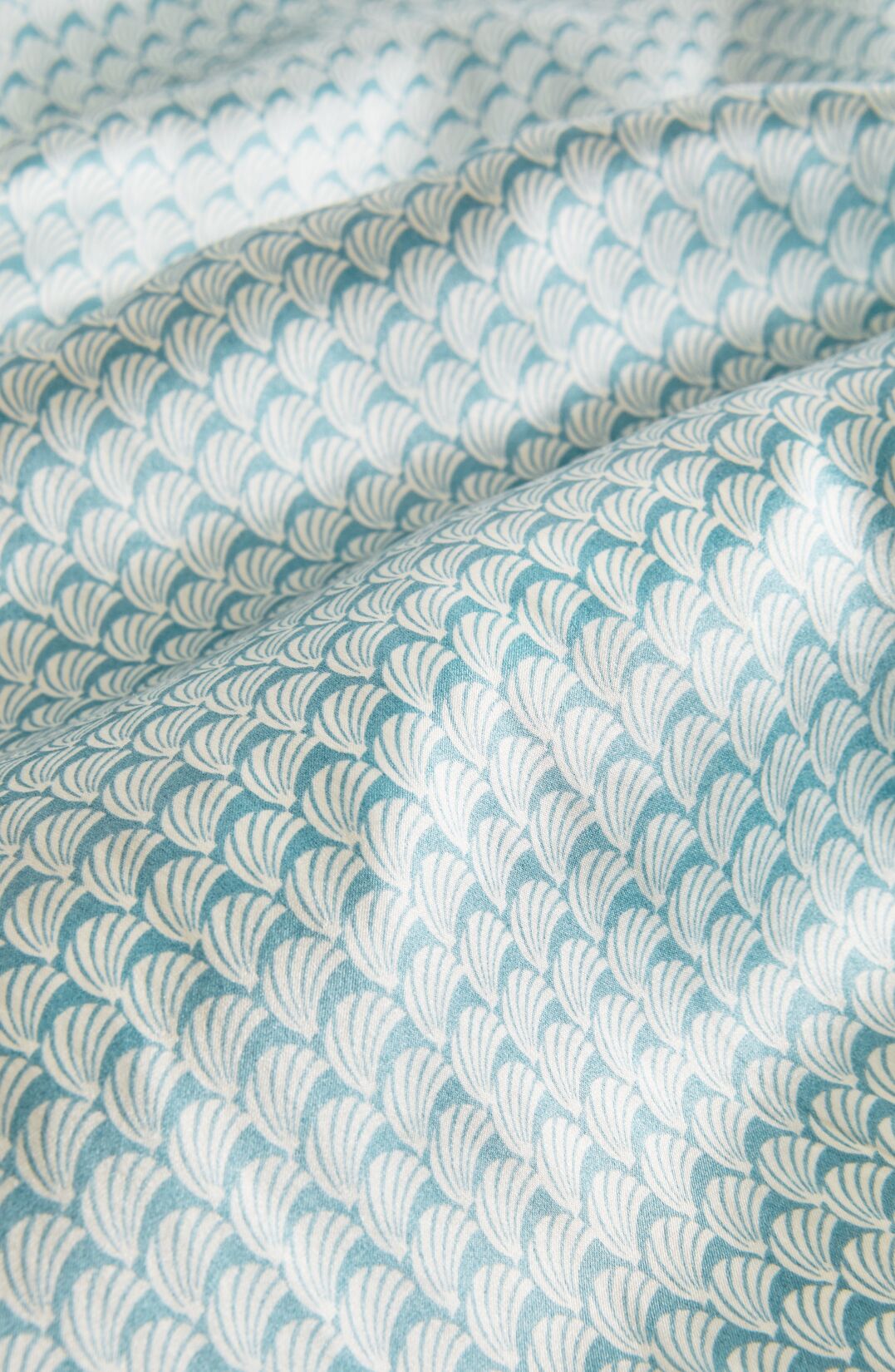 Fabric detail shot of Printed Washable Silk in Seashell Blue Lagoon/Blue Lago