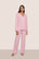 Model is wearing Gisele TENCEL™ Modal Long PJ Set  in Pink Nectar/Ivory