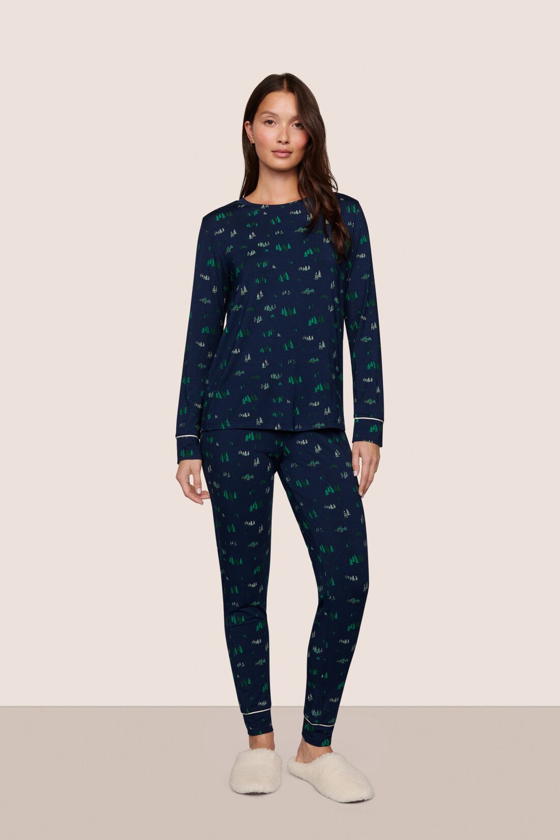 Model is wearing Gisele Printed TENCEL™ Modal Crewneck PJ Set  in Forest Pine Navy/Ivory