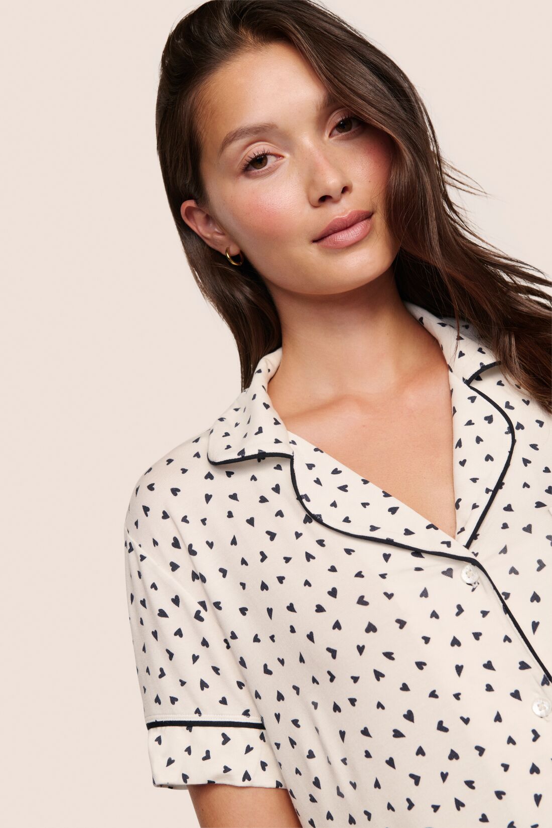 Model is wearing Gisele Printed TENCEL™ Modal Relaxed Short PJ Set  in Heart To Heart Black/Blk