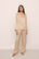 Model is wearing Inez Washable Silk Long PJ Set in Rose Cloud/Champagne