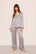Model is wearing Inez Printed Washable Silk Long PJ In Tile Square Gray Dawn/Navy