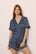 Model Is Wearing Inez Printed Short Pj Set In Petite Batik Indigo Blue