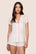 Model is wearing Frida TENCEL™ Modal Shortie Short PJ Set  in Ivory/Pink Nectar