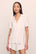 Model is wearing Gisele TENCEL™ Modal Rib Relaxed Short PJ Set in White
