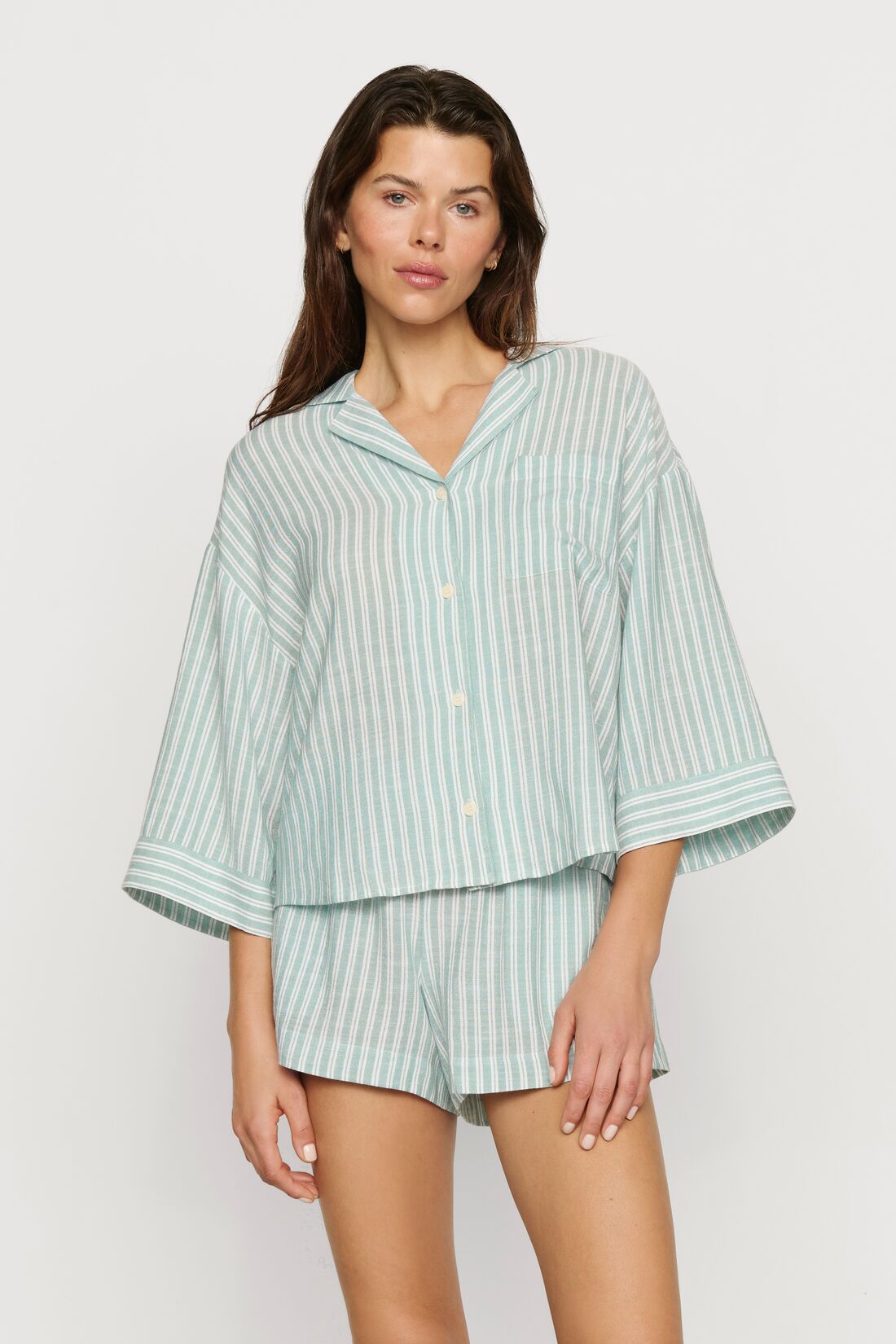 Model is wearing Nautico Relaxed Short PJ Set in Regatta Stripe Seagrass/White
