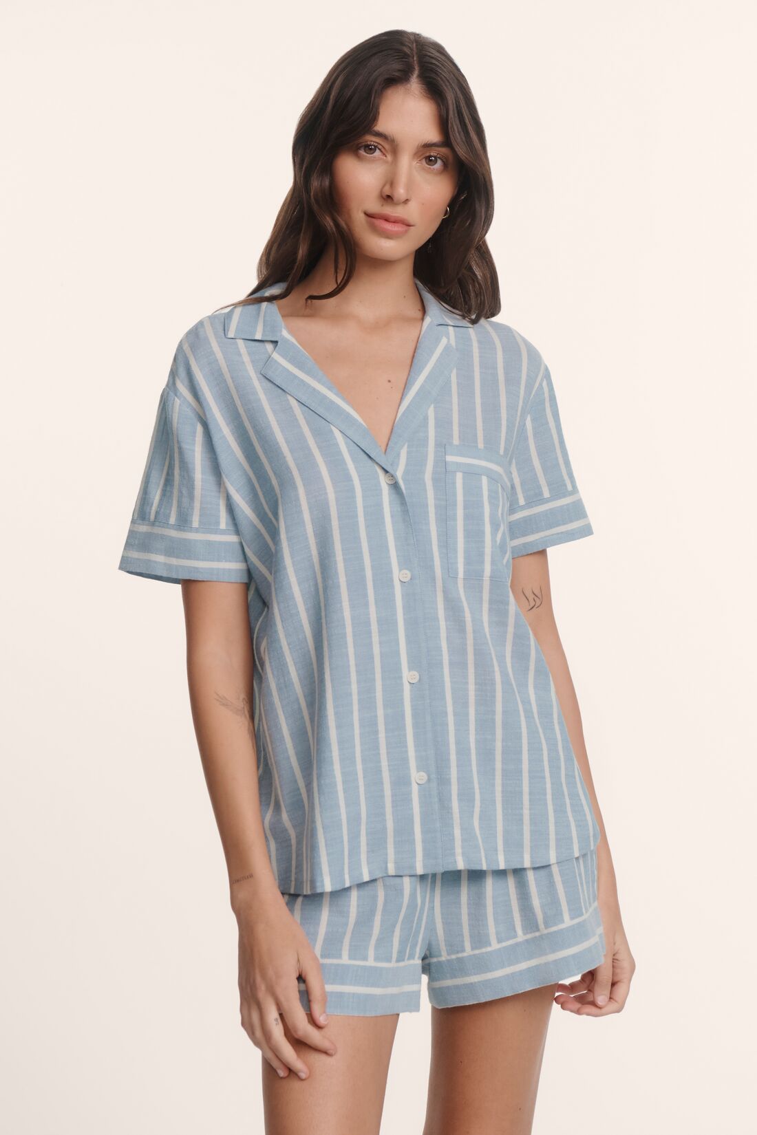 Model is wearing Nautico Shortie Short PJ Set in Classic Stripe Slate Blue/Ivor