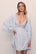Model wears Mariana TENCEL™ Modal Robe in Ice Blue.