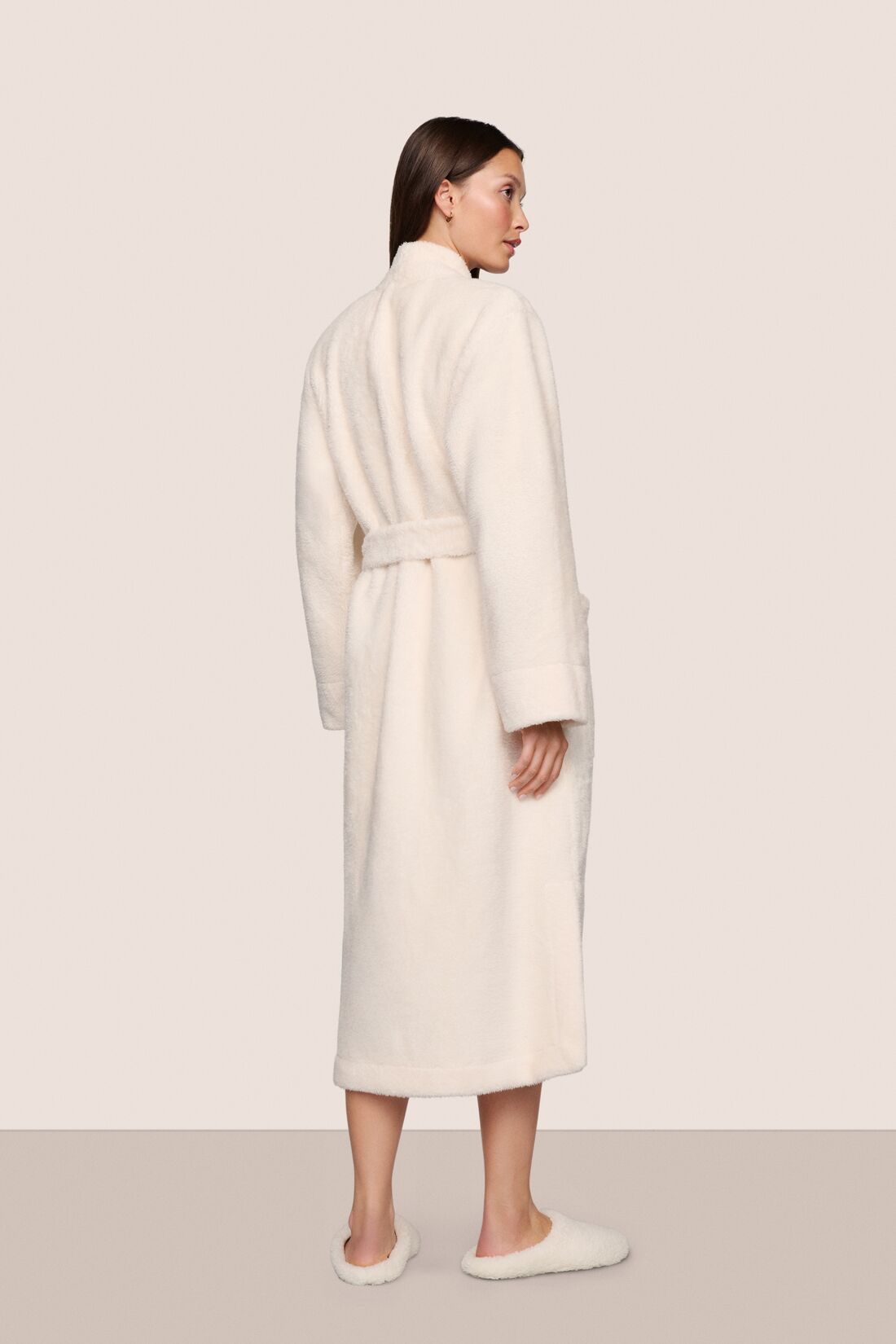 Model is wearing Renew Plush Long Robe  in Ivory