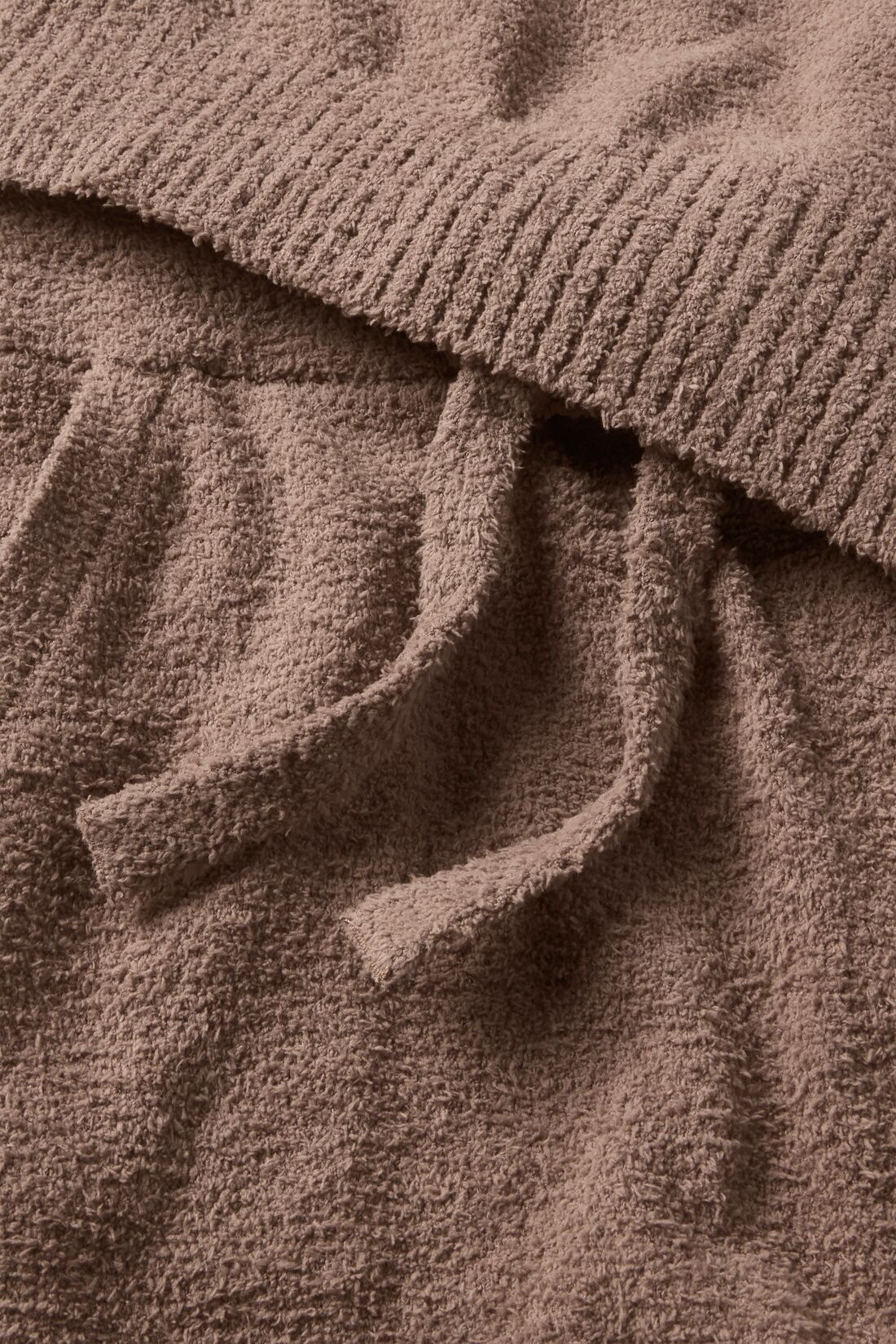 Fabric detail of recycled boucle in deep taupe