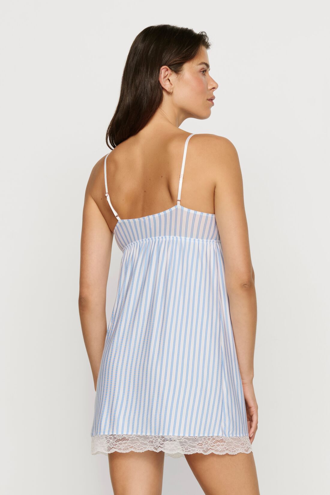 Model is wearing Isla TENCEL™ Modal Slip in Regatta Stripe Summer Blue/Whi