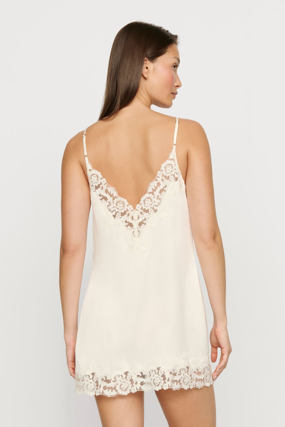 Model is wearing Washable Silk with Lace Embroidery Short Slip in Ivory