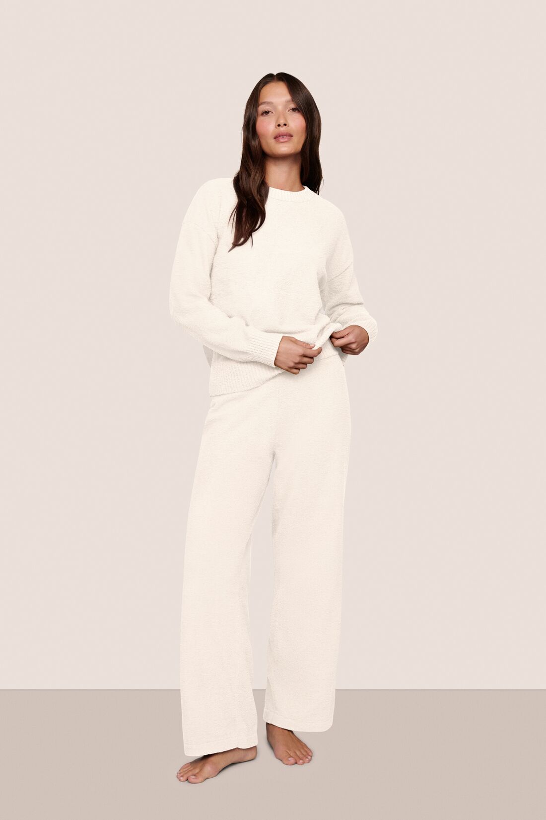 Model wearing recycled boucle pant in ivory