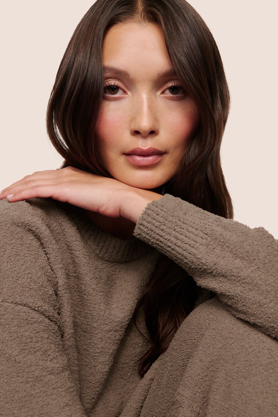 Model is wearing Recycled Boucle Crew Neck Pullover  in Deep Taupe