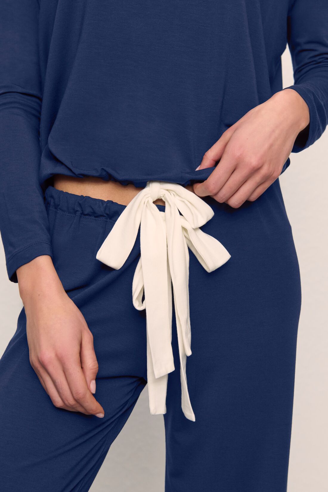 Model wearing Gisele TENCEL Modal Slouchy PJ Set in Navy/Ivory