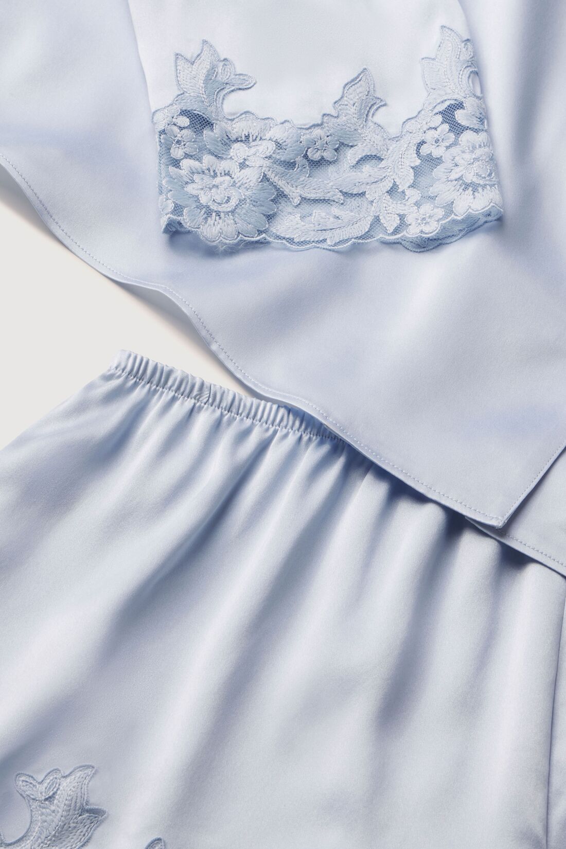 Model is wearing Washable Silk with Lace Embroidery Long Sleeve Top & Short PJ Set in Powder Blue