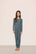 Model is wearing Kids TENCEL™ Modal Unisex Long PJ Set  in  Stone Blue/Ivory