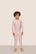 Model is wearing Kids Printed TENCEL™ Modal Unisex Long PJ Set  in Duo Stripe Hollyred/Hollyred