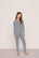 Model is wearing Kids Printed TENCEL™ Modal Unisex Long PJ Set  in Seashell Navy/Navy