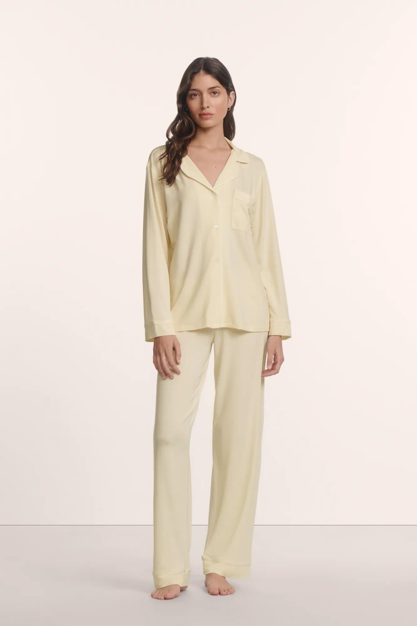 Model is wearing Gisele TENCEL™ Modal Long PJ Set in Buttercream/Ivory