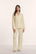 Model is wearing Gisele TENCEL™ Modal Long PJ Set in Buttercream/Ivory