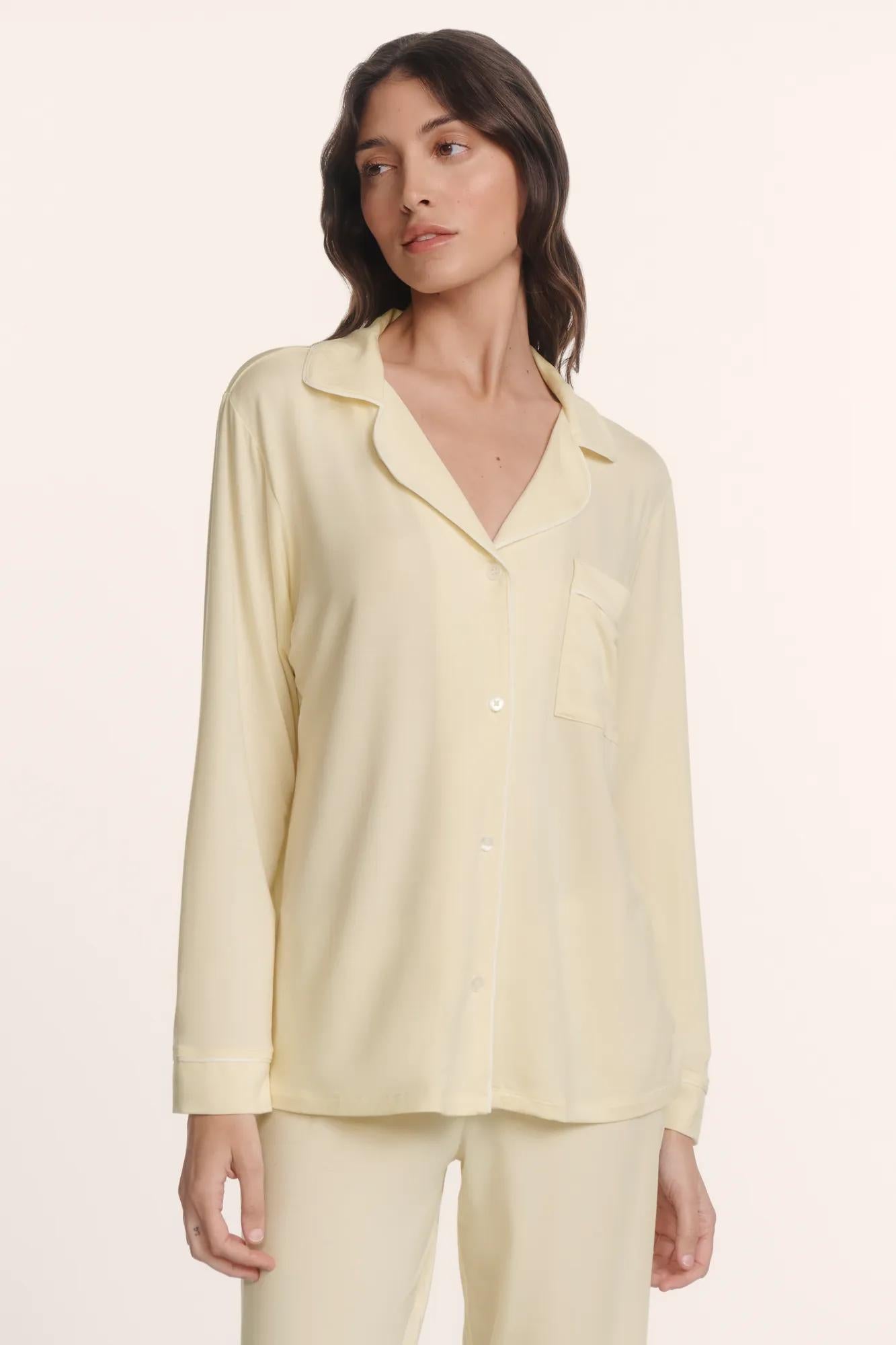 Model is wearing Gisele TENCEL™ Modal Long PJ Set in Buttercream/Ivory
