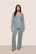 Model is wearing Gisele TENCEL™ Modal Long PJ Set  in Lead/Ivory