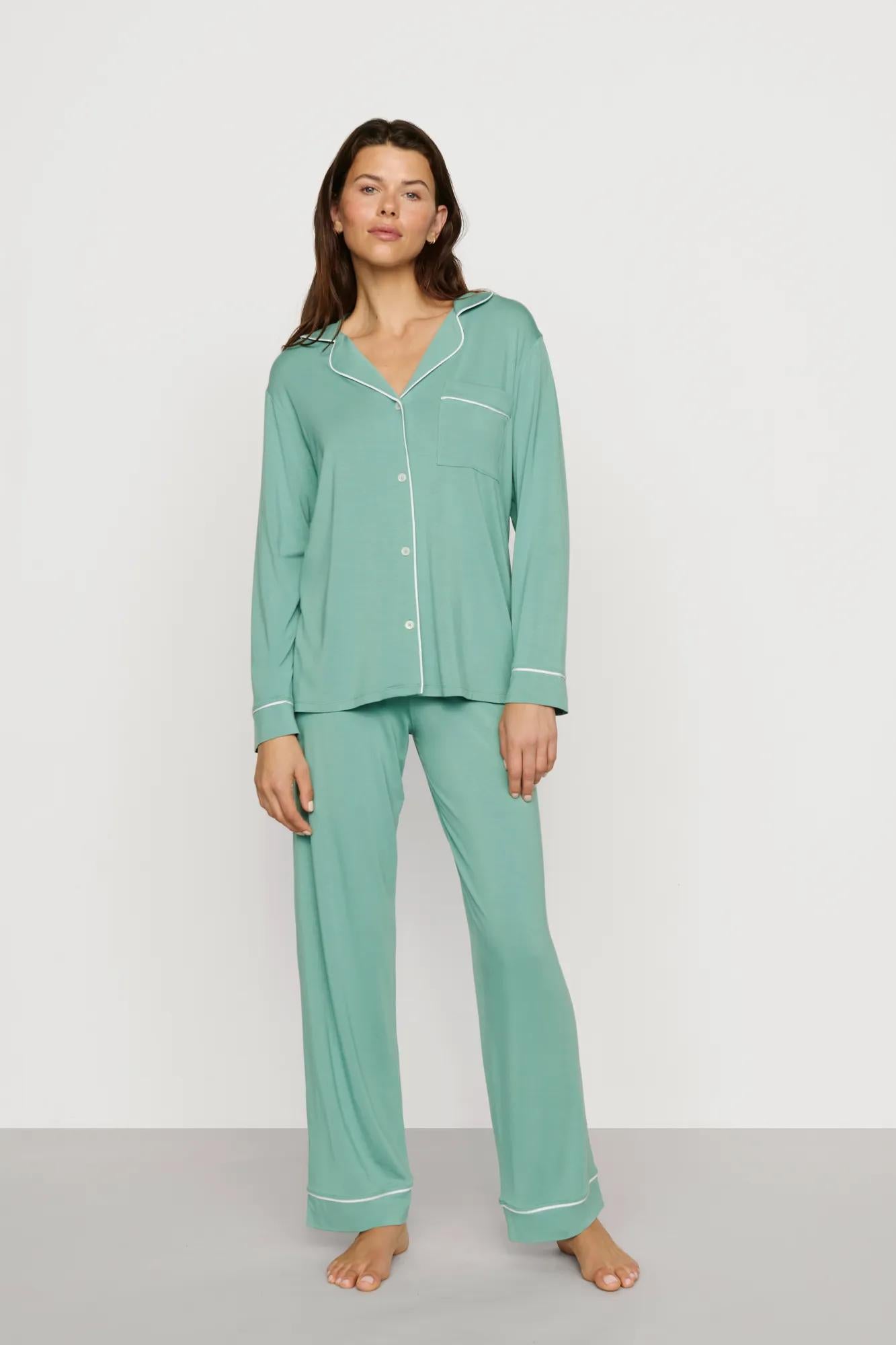Model is wearing Gisele TENCEL™ Modal Long PJ Set in Seagrass/White