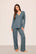 Model is wearing Gisele TENCEL™ Modal Long PJ Set  in  Stone Blue/Ivory