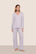 Model is wearing Gisele TENCEL™ Modal Long PJ Set  in Thistle/Ivory